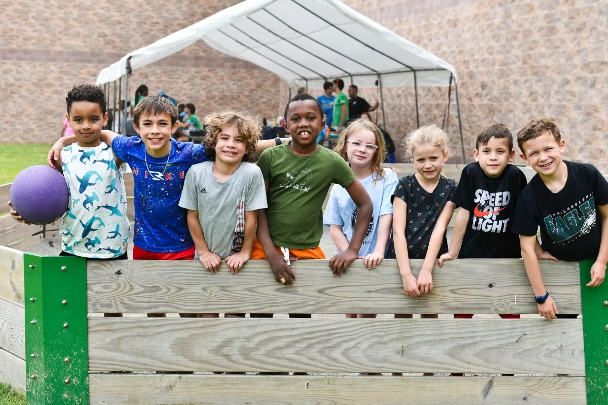 Campers playing gaga ball outside at Ambler Y's summer camp