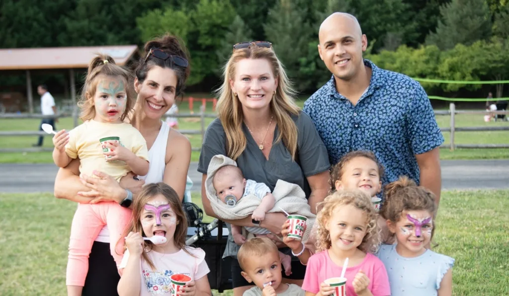 Parents and children at outdoor family event at Mount Laurel Y