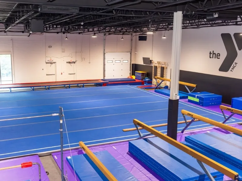 Open area with balance beams inside Haverford's Y Gymnastics Center