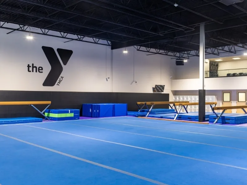 Open area with balance beams inside Haverford's Y Gymnastics Center