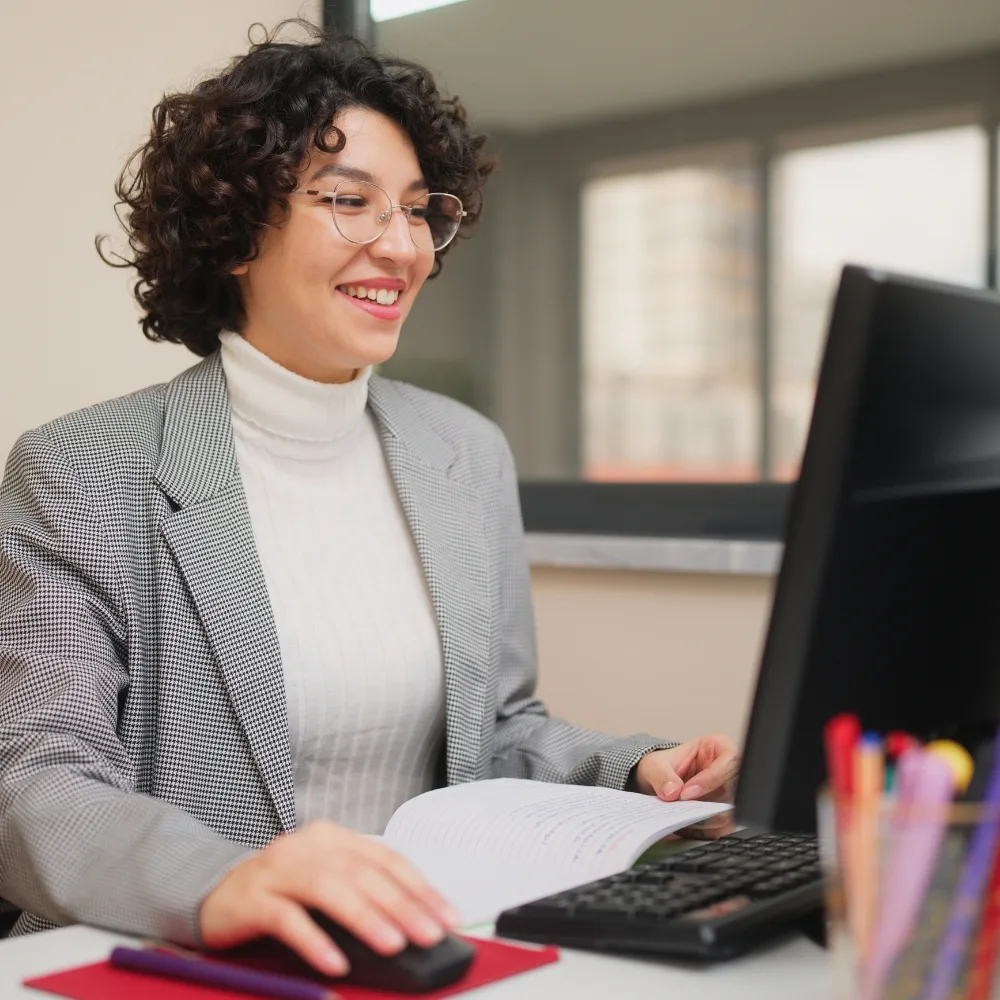 Woman working at a computer