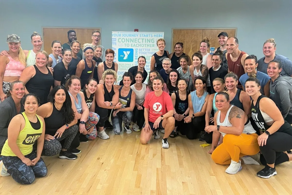 Group exercise gathering inside a studio