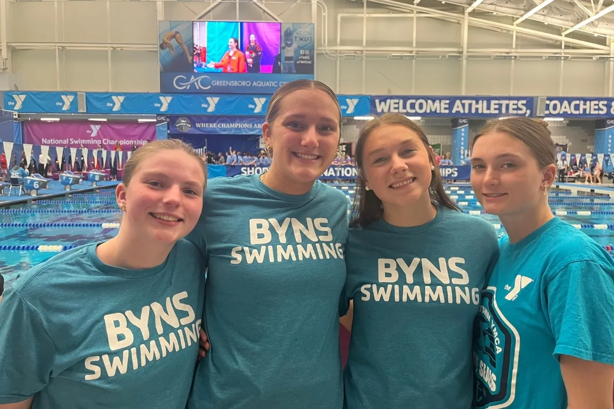 Boyertown Y's youth swim team at an indoor swim competition