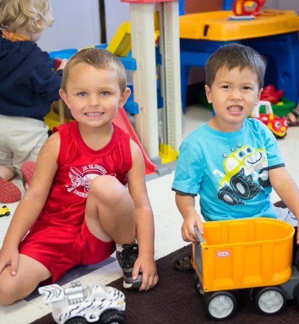 Children playing with toys inside