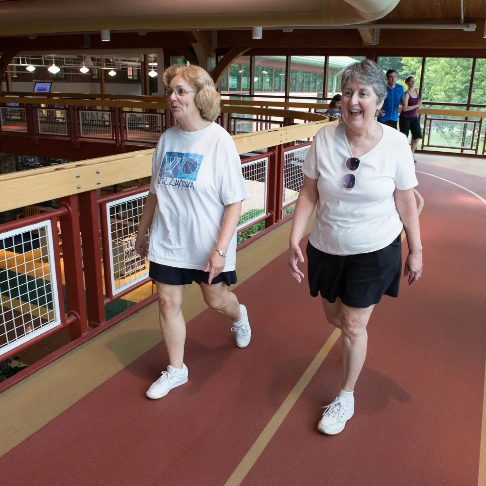 Members walking on indoor track at Phoenixville Y
