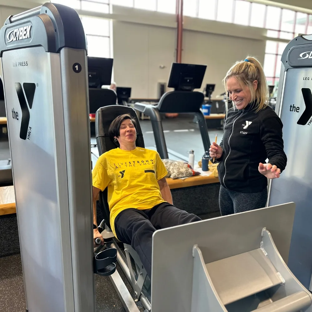 Personal training on exercise equipment at Phoenixville's Y Livestrong Wellness program