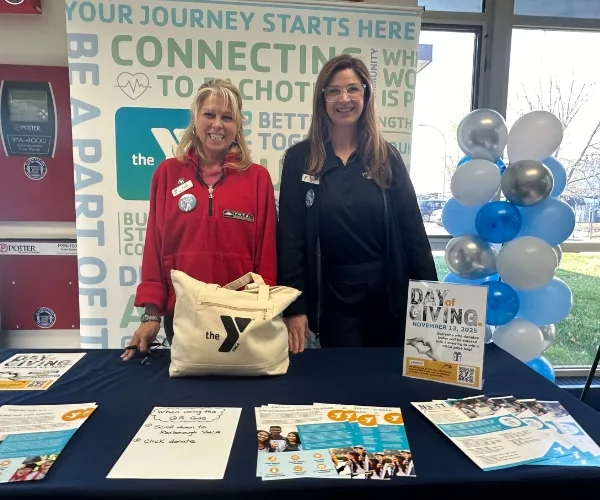 Y staff members tabling at Day of Giving indoor event