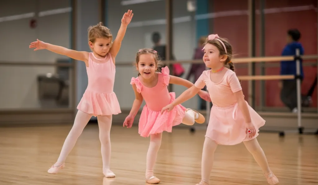 Children learning ballet in a studio