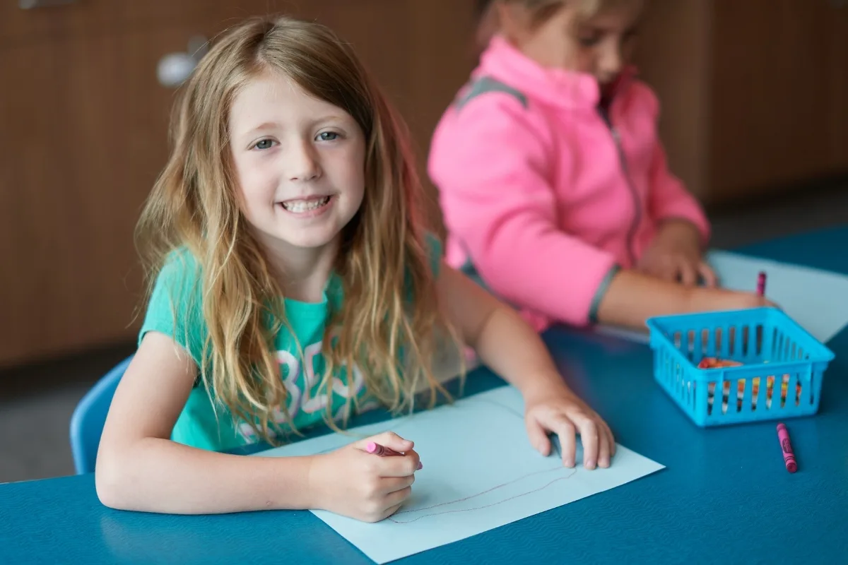 Child drawing on paper