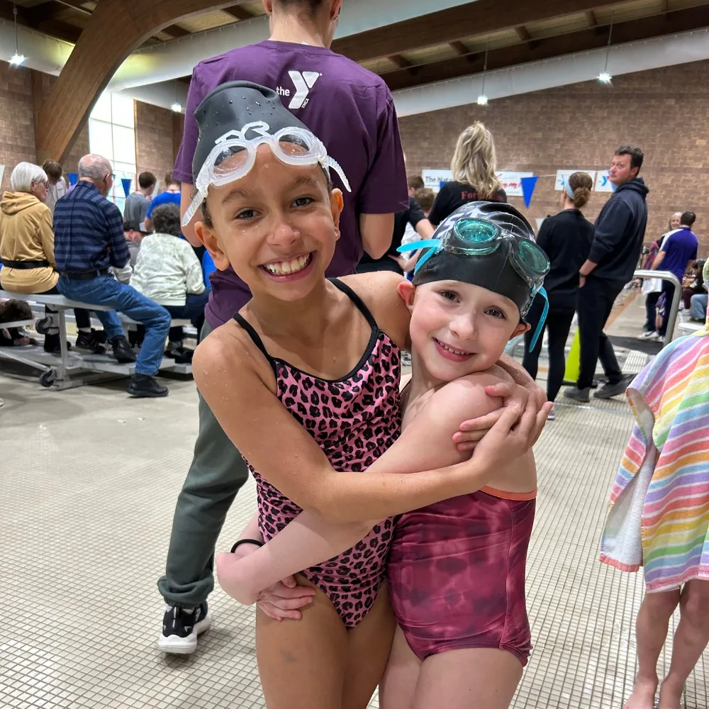 Greater Philadelphia Y's youth swim team inside an indoor pool