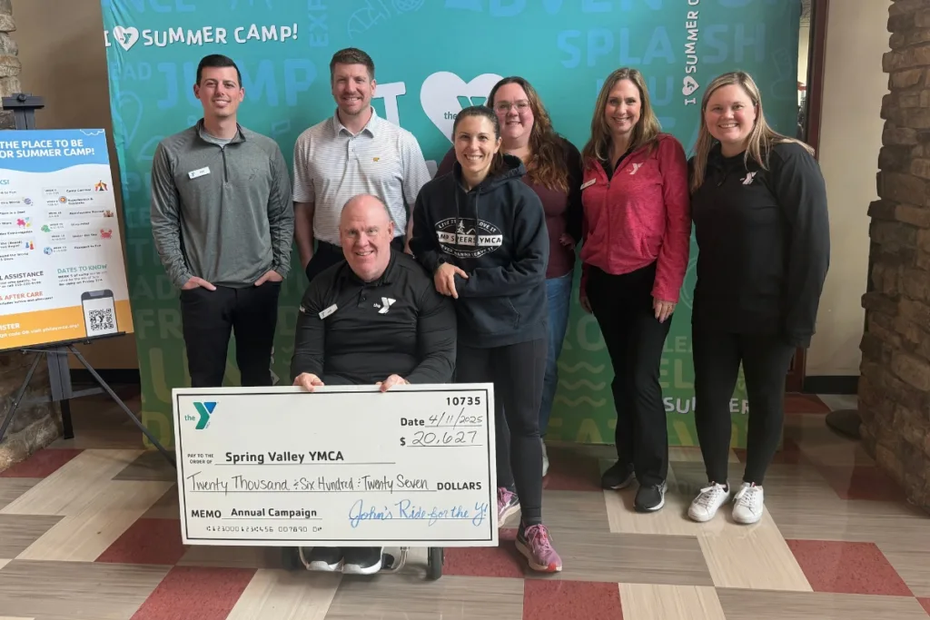 Y staff members accepting donation for Annual Campaign