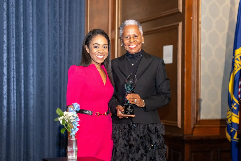 Y leadership accepting award