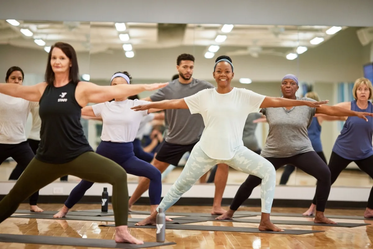 Group Zumba dance class inside a studio