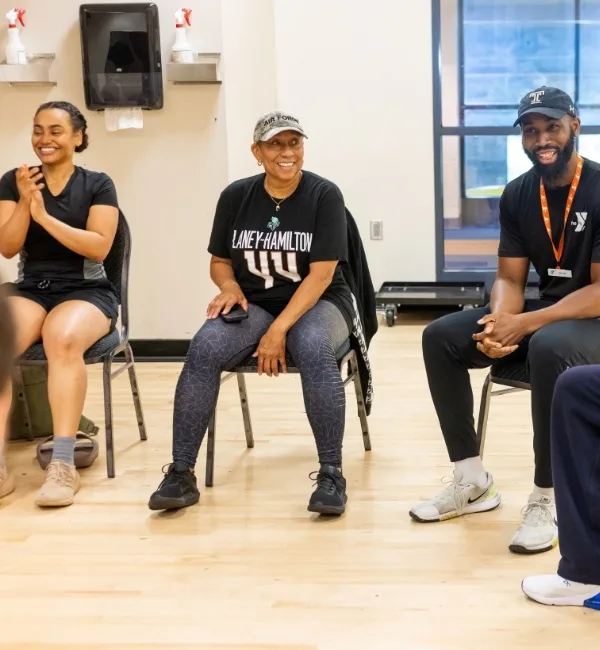 Group of members at a Veterans Wellness group exercise class in a studio