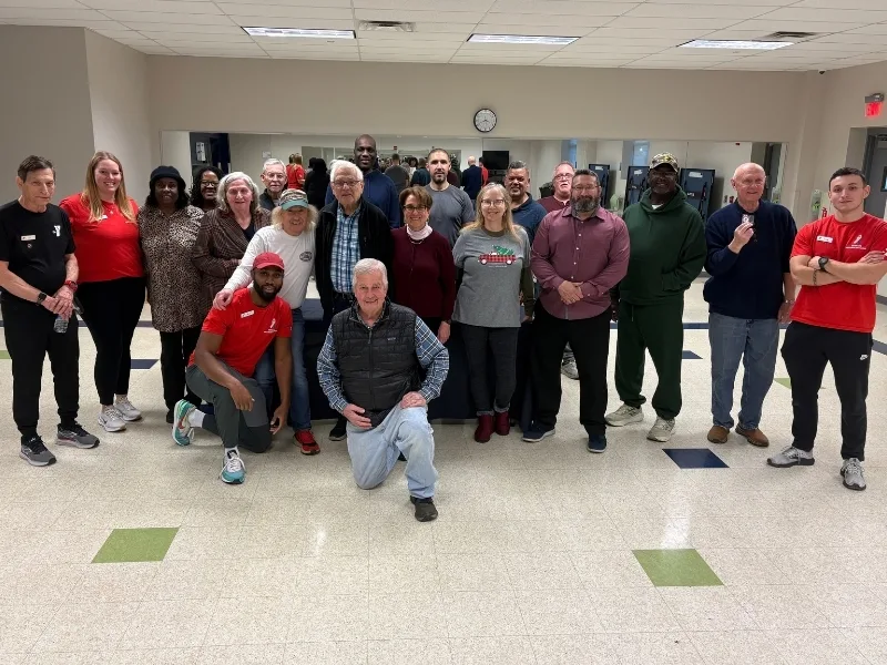 Group of people at a community event in recreation room