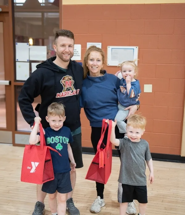 Family at a family event inside gymnasium