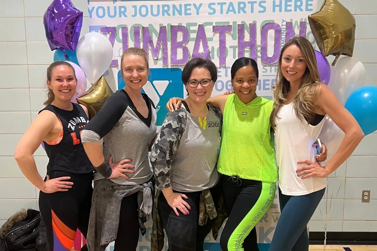 Members at Zumba exercise event inside studio