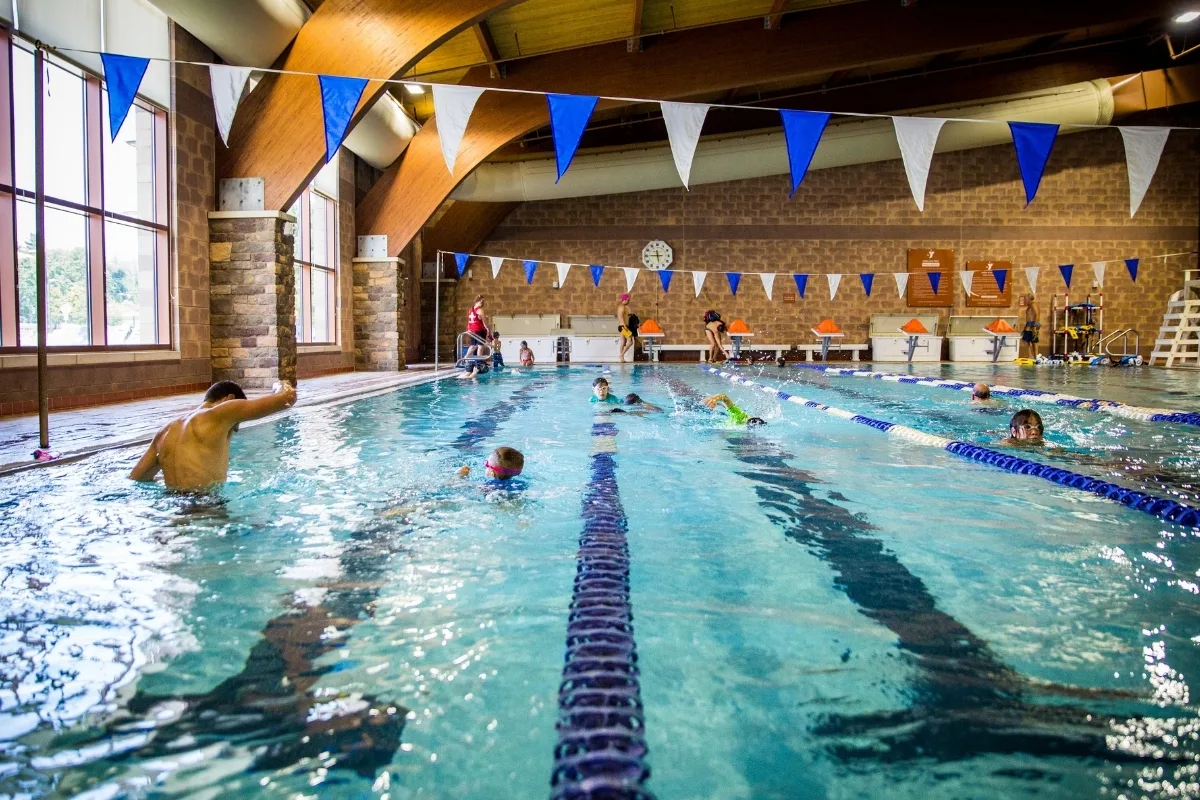Members inside indoor pool