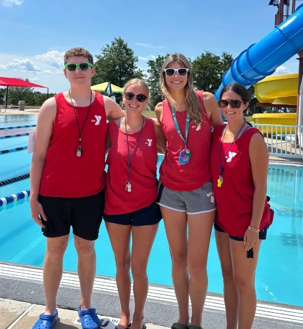 Group of lifeguards at outdoor pool at Spring Valley Y