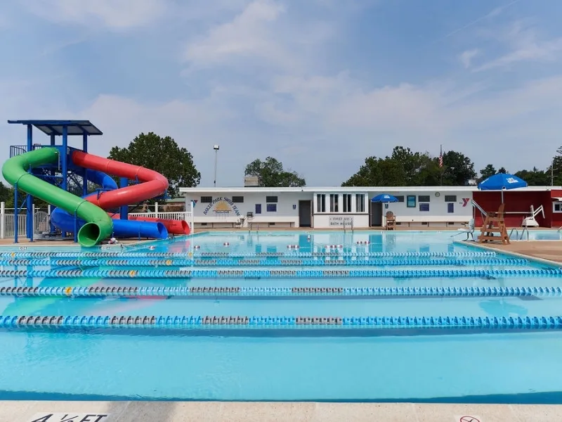 Outdoor pool with slides at Phoenixville Y