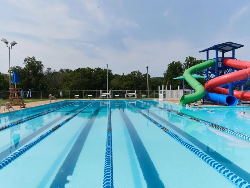 Outdoor pool with slides at Phoenixville Y