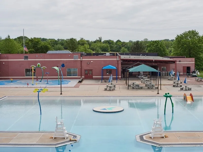 Outdoor pool pavilion with kids pool area at Spring Valley Y