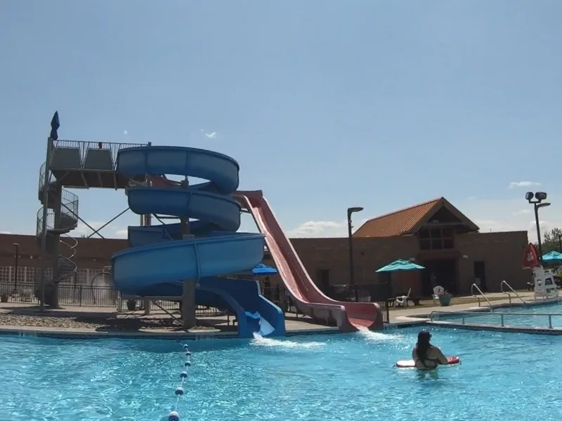 Outdoor pool with slides at Ambler Y