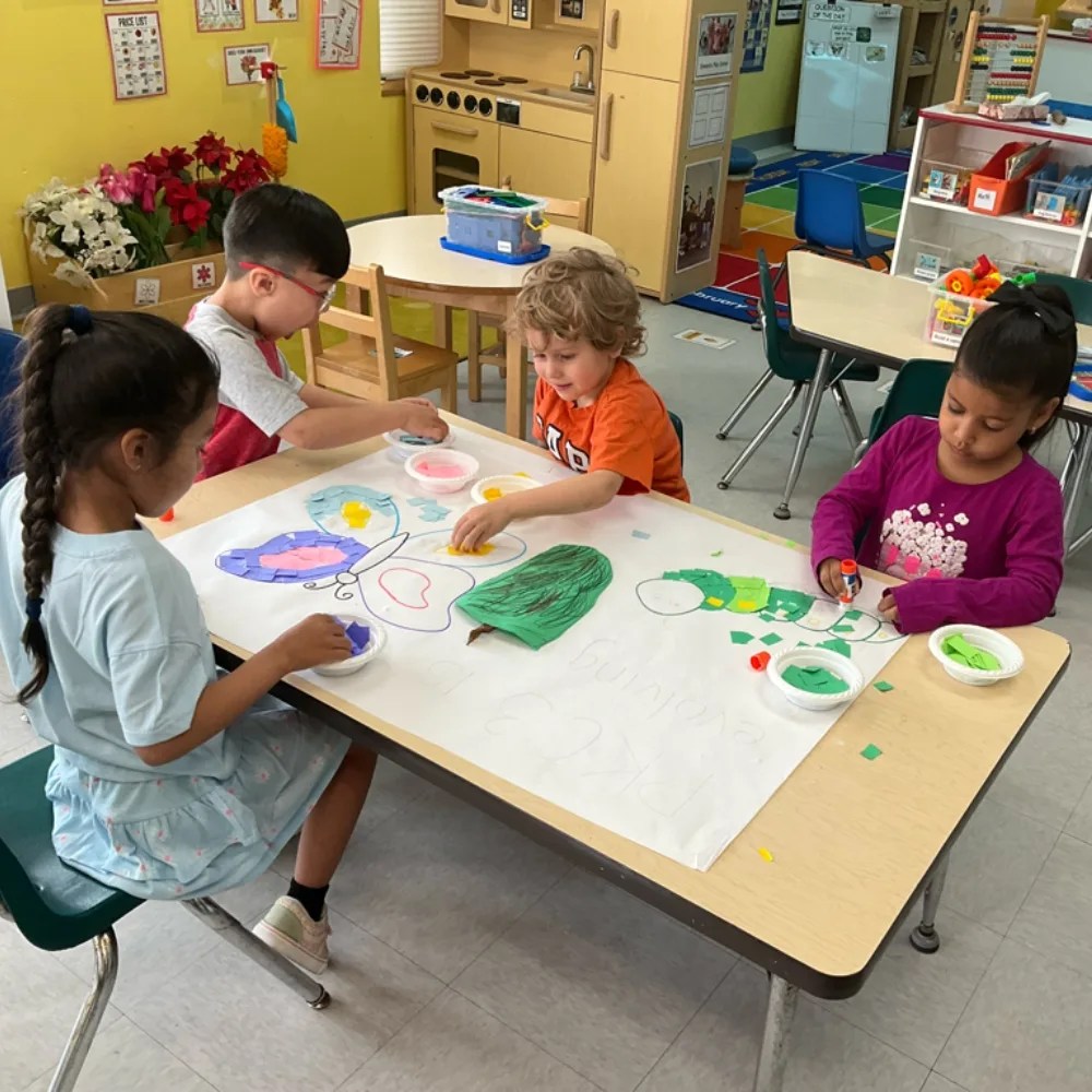 Children doing arts and crafts in a classroom