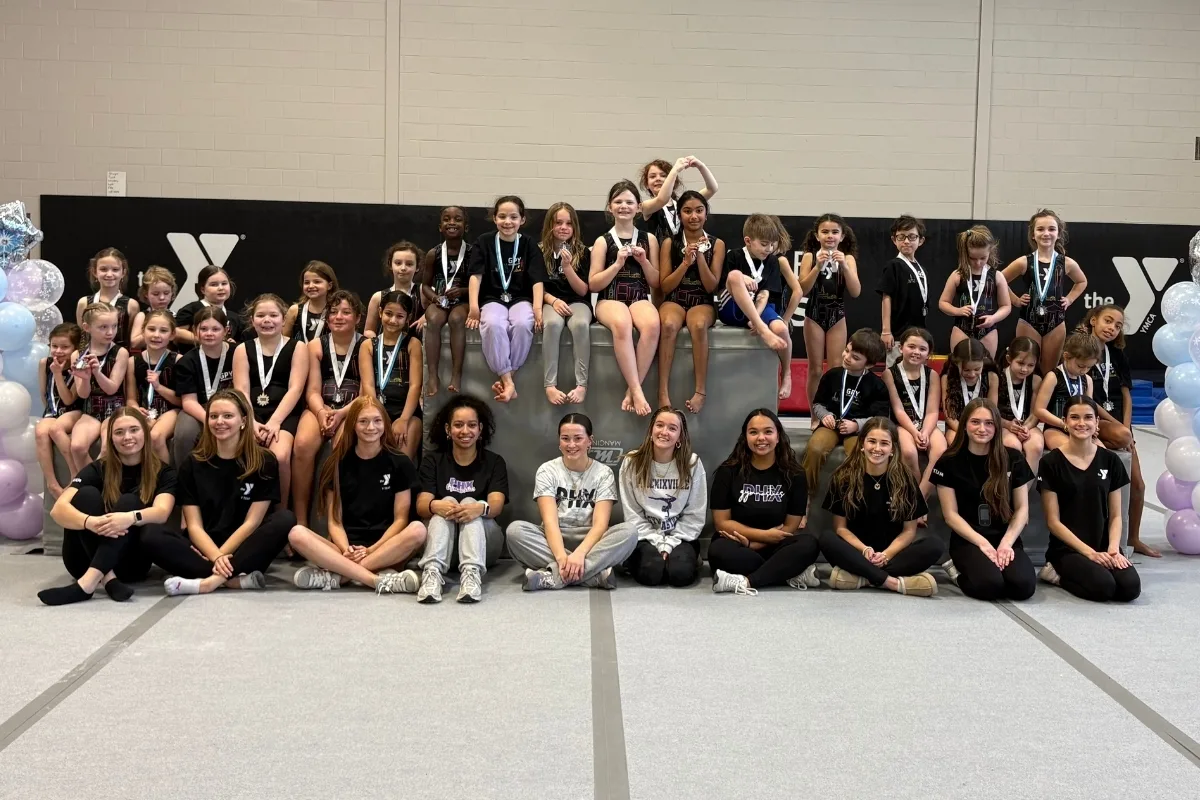 Phoenixville Y's youth gymnastics team inside gymnasium