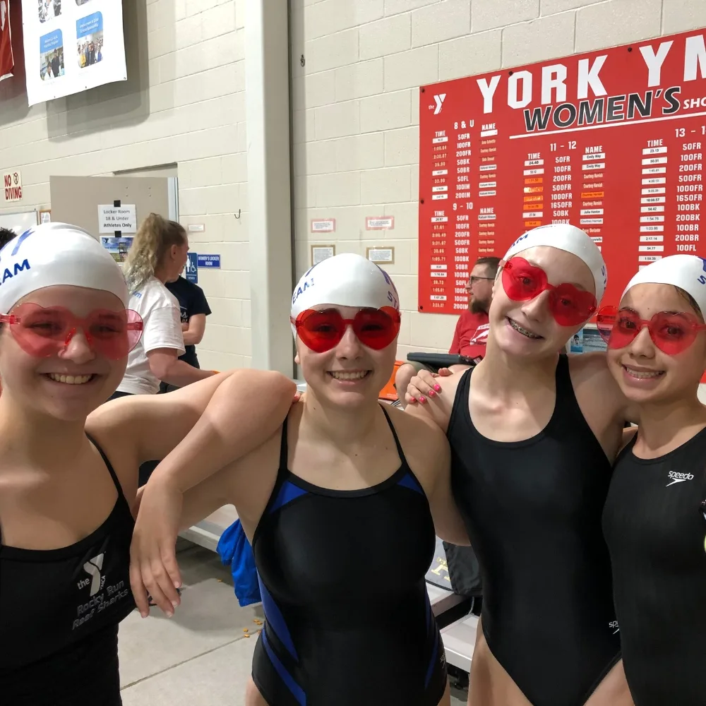 Rocky Run Y's youth swim team at indoor pool