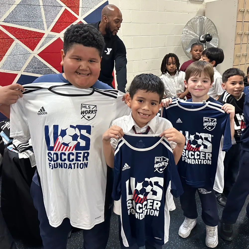 Youth athletes at Soccer for Success sports clinic