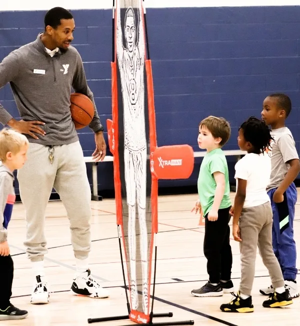 Children practicing flag football with flag football equipment