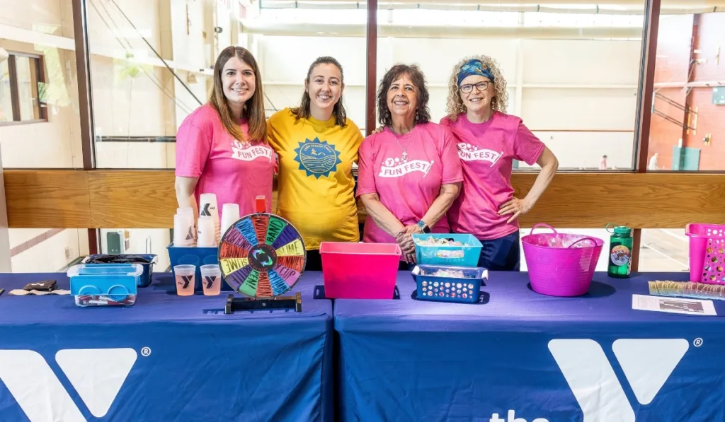 Y volunteers tableting at Y Fun Fest