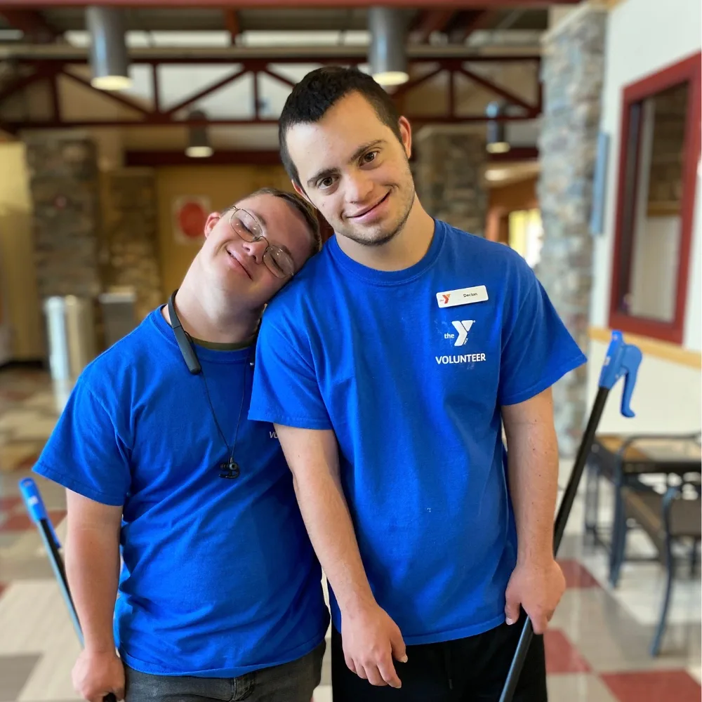 Y volunteers helping clean the lobby of a Y facility