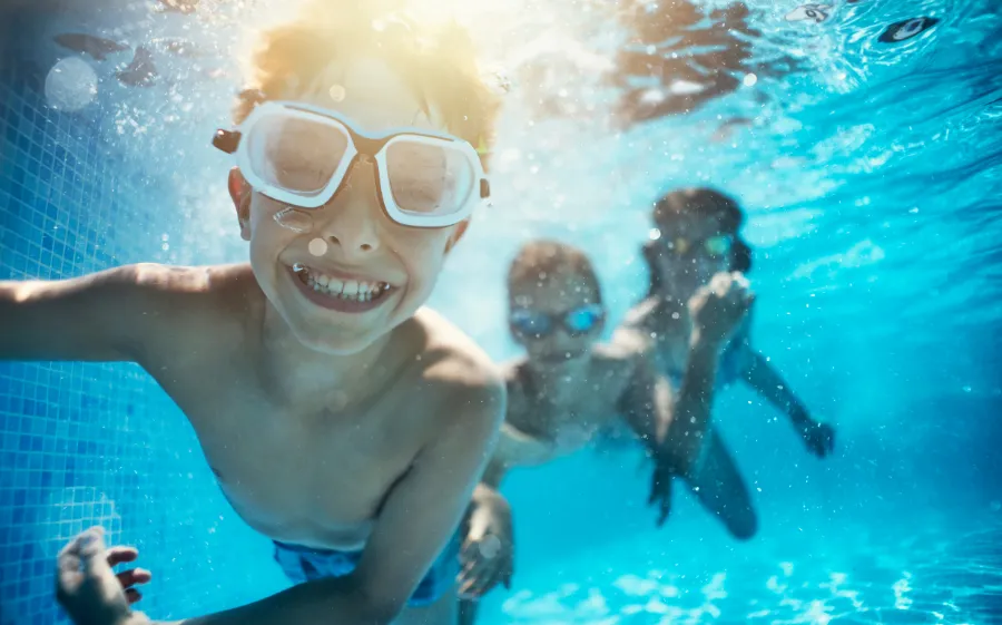 children swimming underwater