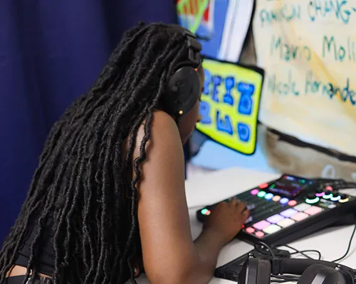 Teen Making Music