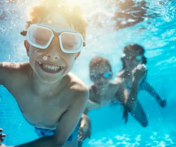 children swimming underwater
