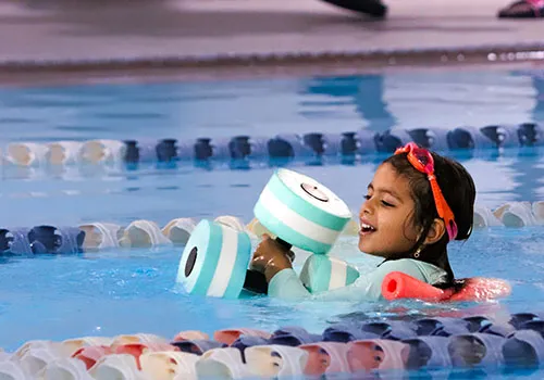 child learning to swim