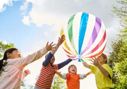 Preschool kids playing outside